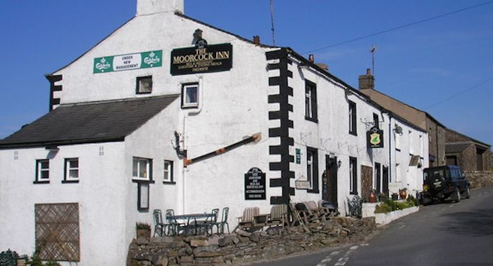 The Moorcock Inn, a whitewashed pub at Garsdale Head